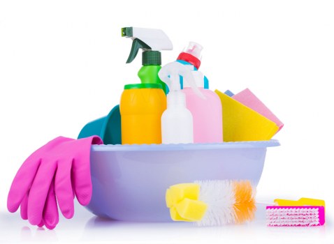 Team member carrying out a risk-assessed cleaning task