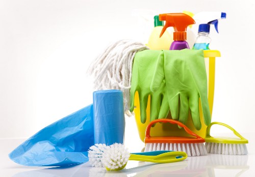 Acton Cleaners staff completing the final stage of a cleaning service