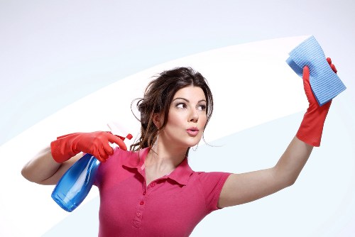 Acton cleaning service team performing detailed deep cleaning in a home kitchen